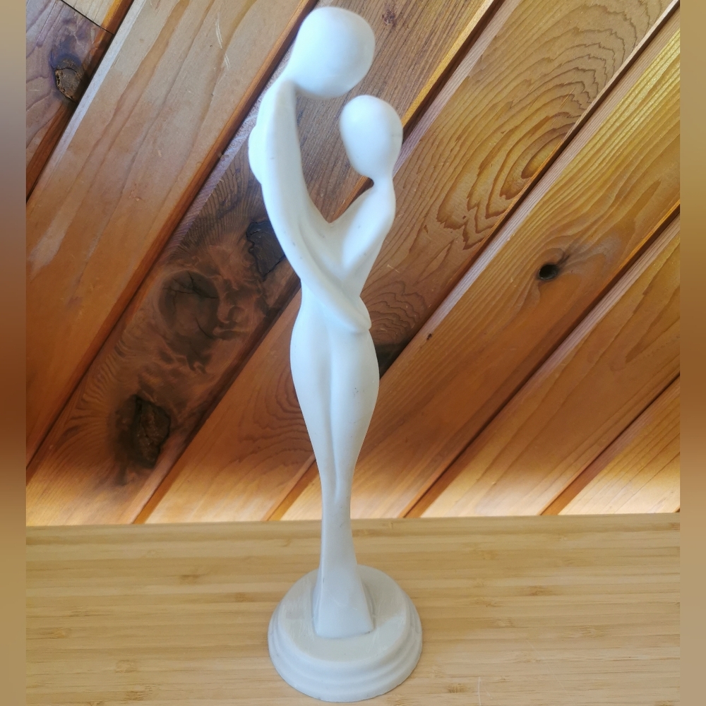 Tall Elegant Embrasing Couple Sculpture